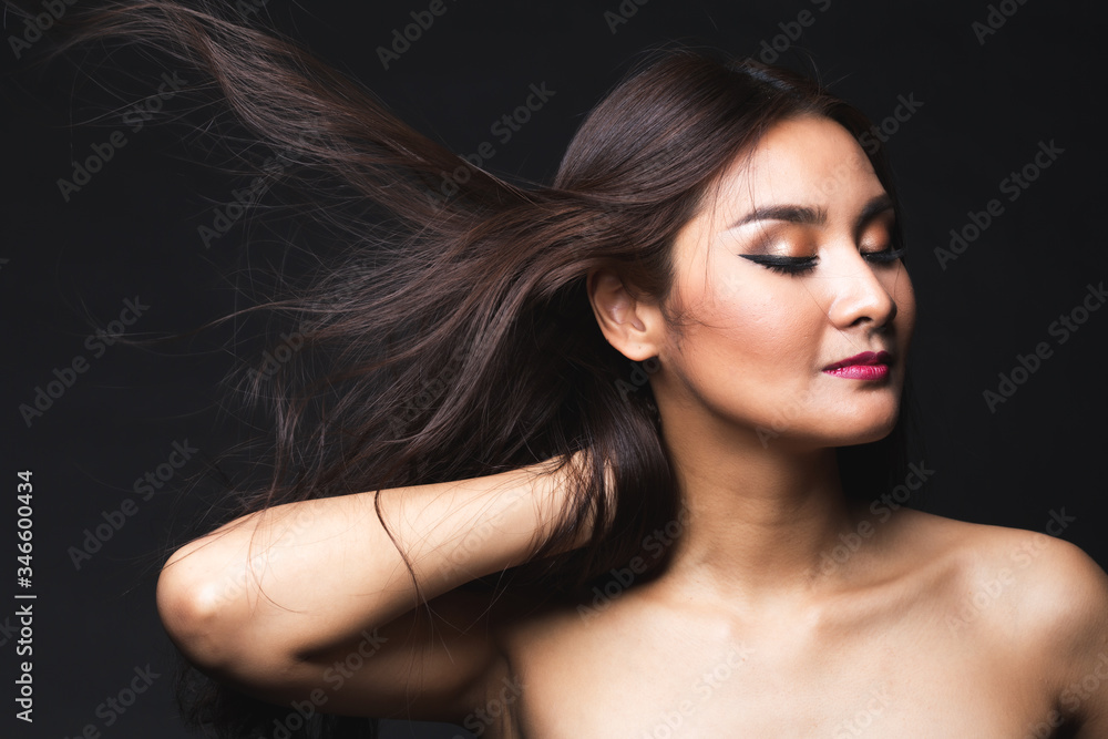 Portrait of young asian woman with makeup long hair. Portrait of young asian woman with makeup long hair.