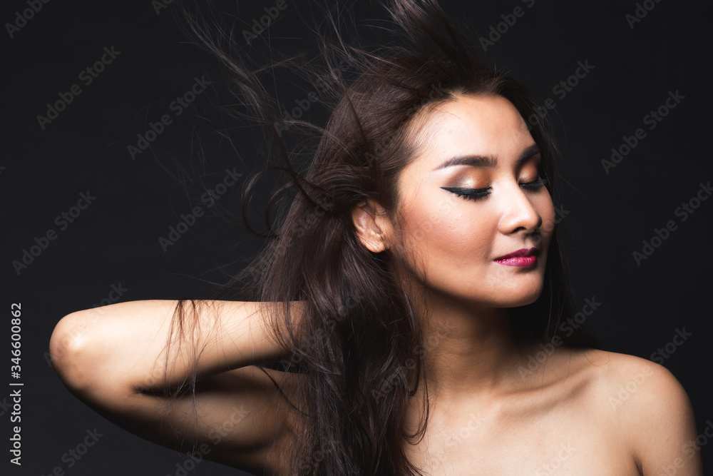 Naklejka premium Portrait of young asian woman with makeup long hair.
