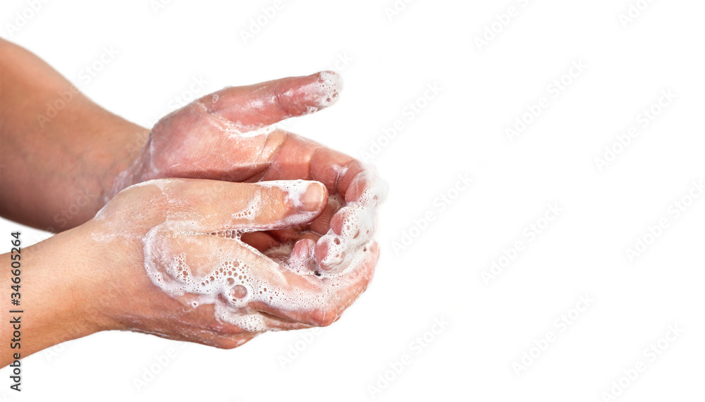 Young man wash hands with soap, closeup detail on soap bubbles, isolated on white, space for text right side. Can be used during coronavirus covid-19 outbreak prevention Young man wash hands with soap, closeup detail on soap bubbles, isolated on white, space for text right side. Can be used during coronavirus covid-19 outbreak prevention