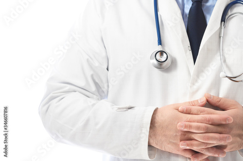 Confident doctor posing with hands crossed on white isolated background, medical advice and health insurance concept .