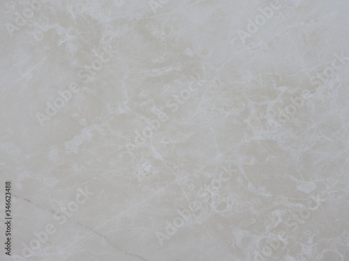 Marble with natural pattern. Beige marble stone wall texture. photo