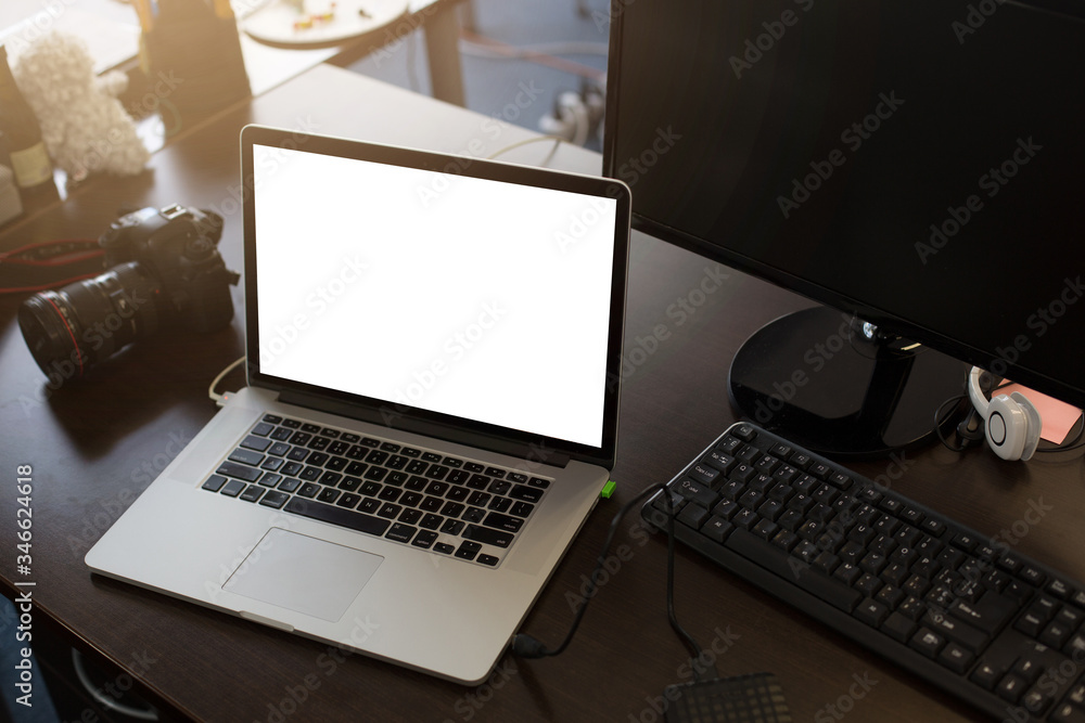 Fototapeta premium Laptop with blank screen on table
