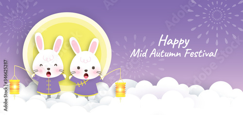 Mid autumn festival banner with cute rabbits and the moon in paper cut style.