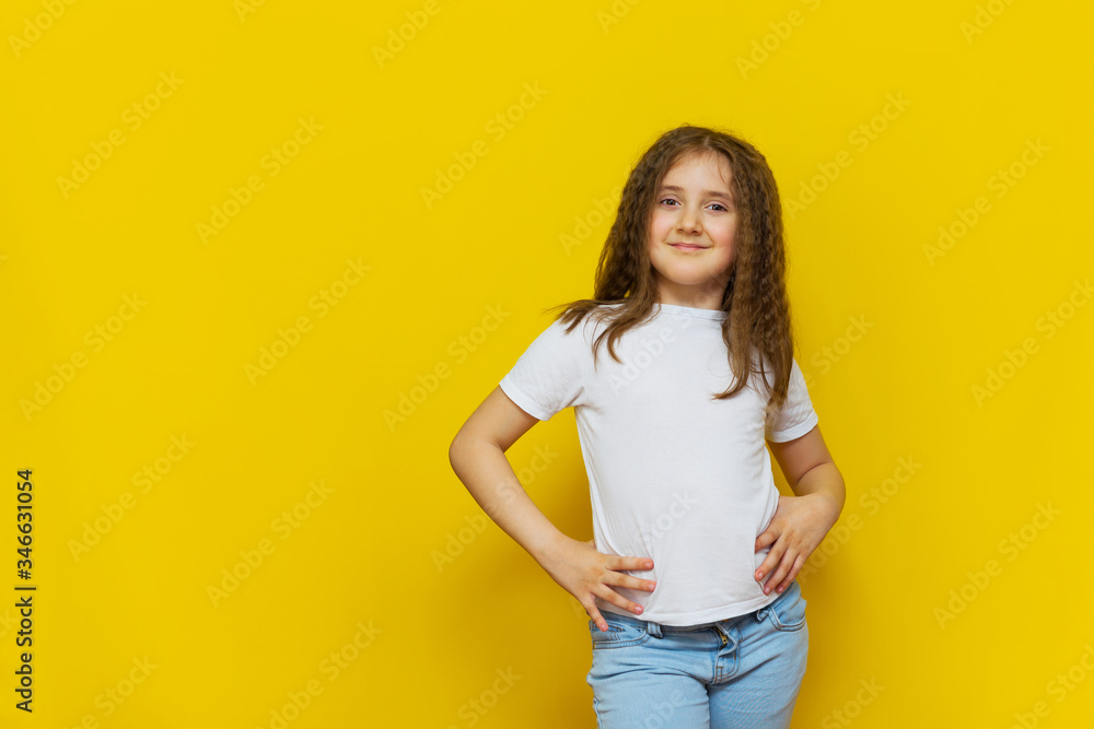Beautiful little fashion model on Yellow studio background. Beautiful little fashion model on Yellow studio background.