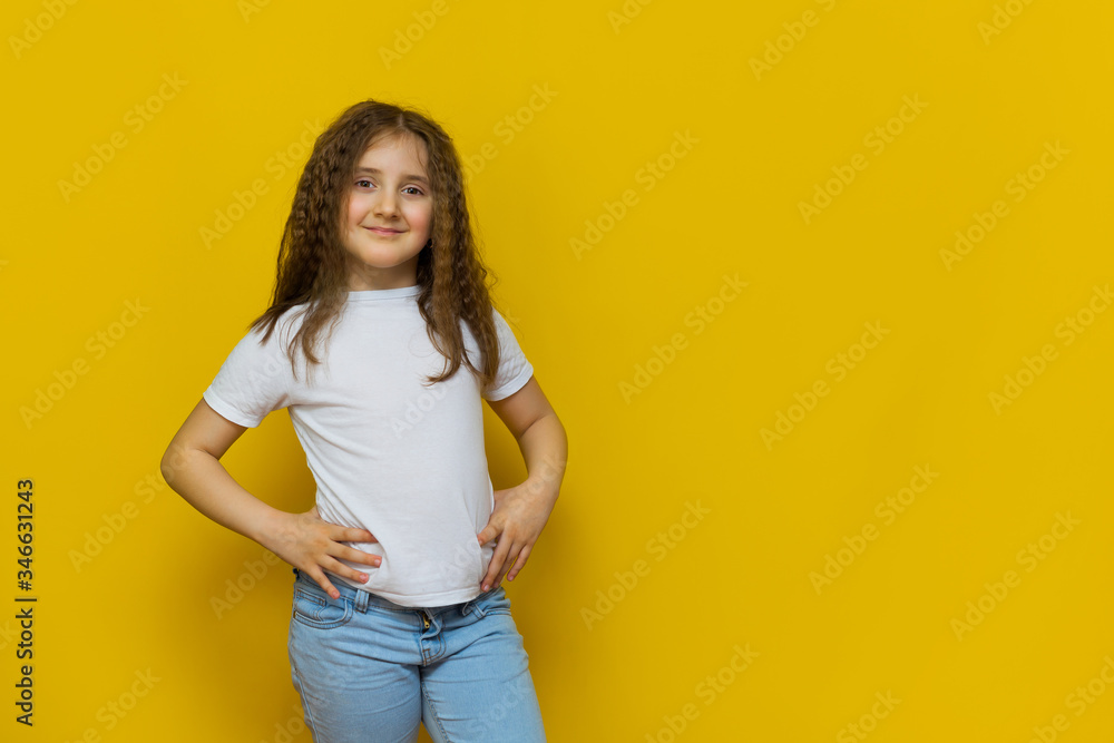 Beautiful little fashion model on Yellow studio background. Beautiful little fashion model on Yellow studio background.