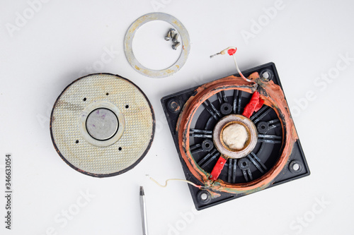 Speaker repair, disassembled speaker. High-frequency speaker 6GDV-7-16 on white background. A component of a three-way speaker system. photo