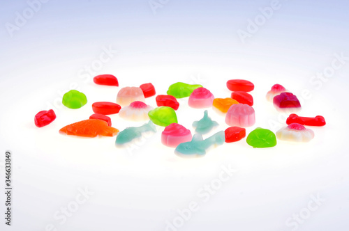 Bright colorful sweets isolated on white background