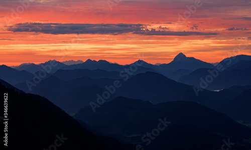 Mountain silhouettes layers of the Bavarian Alps during sunrise from Jochberg Walchensee, Bavaria Germany. © Bastian Linder