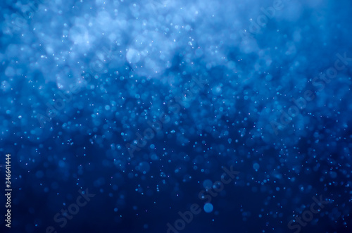 Blue bokeh abstract background.