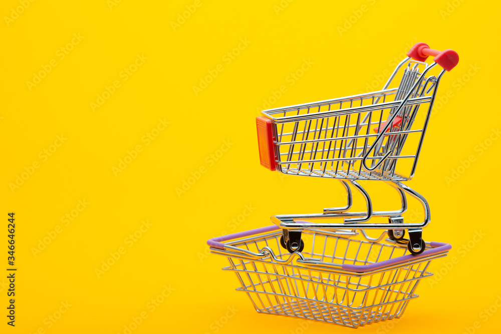 On an empty grocery cart is an empty grocery cart
