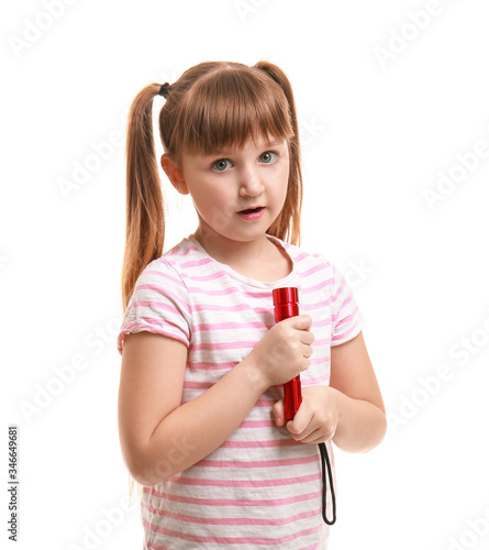 Little girl with flashlight...