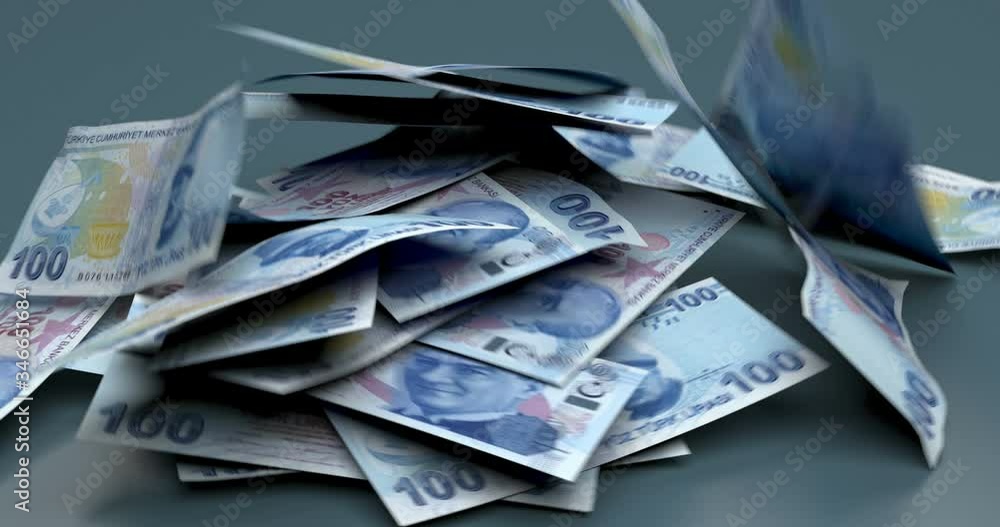 Turkish Lira falling on hued background Turkish Lira falling on hued background