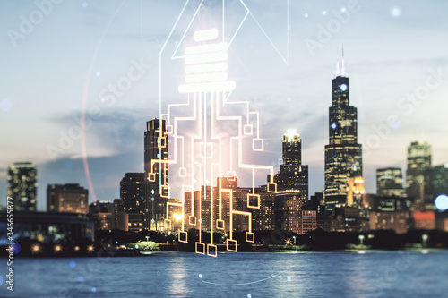 Double exposure of virtual creative light bulb hologram with chip on Chicago city skyscrapers background  idea and brainstorming concept
