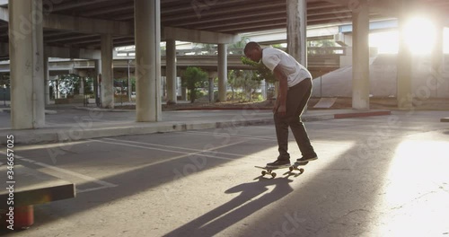 African American skateboarder at skate park