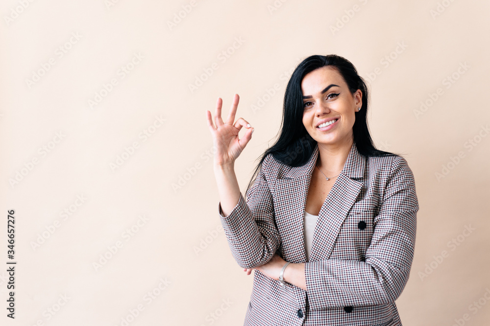 Close up photo beautiful amazing attractive lady arm show okey symbol, on the yellow bright background Close up photo beautiful amazing attractive lady arm show okey symbol, on the yellow bright background