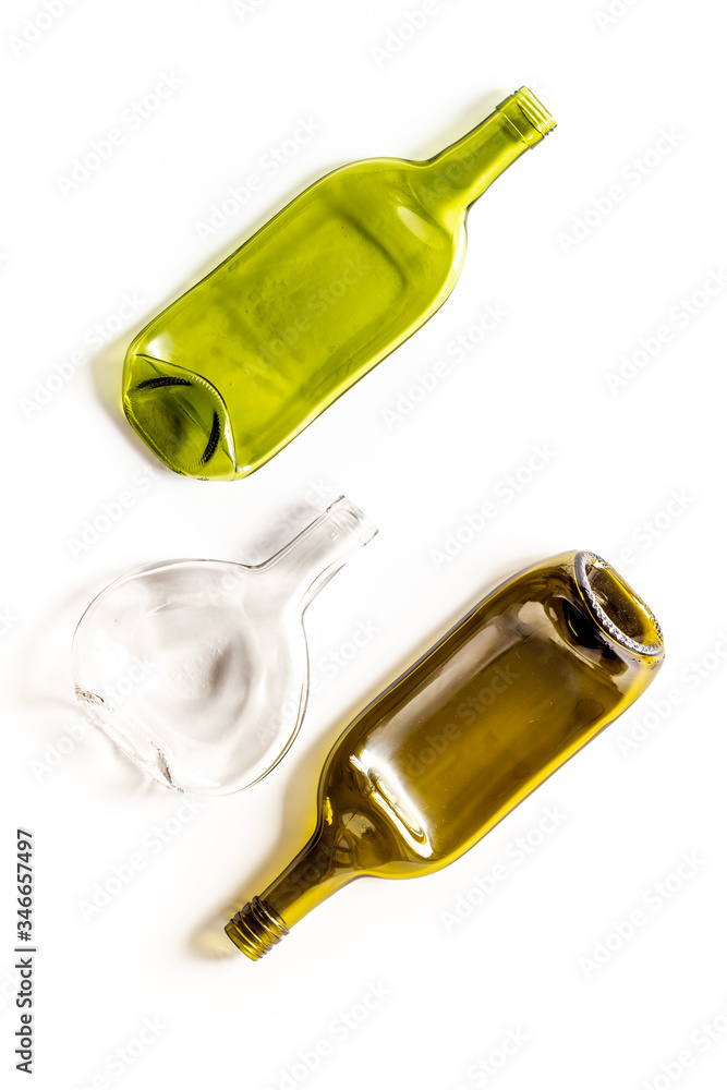 Fototapeta premium A lot of bottles on white table top view