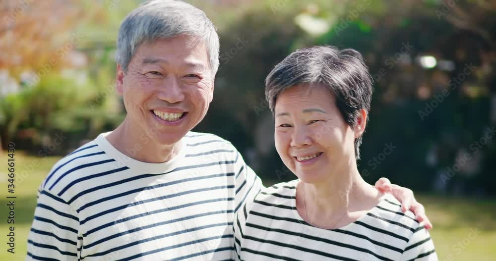 Asian elderly couple smile at you Asian elderly couple smile at you