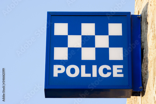 Police Station Blue and white generic checkered patterned sign