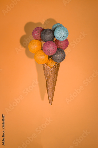 colored balls with cone and ice cream appearance