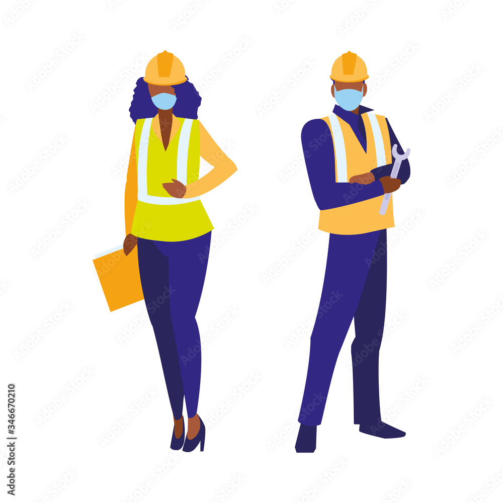 Industrial workers couple working with face mask Industrial workers couple working with face mask