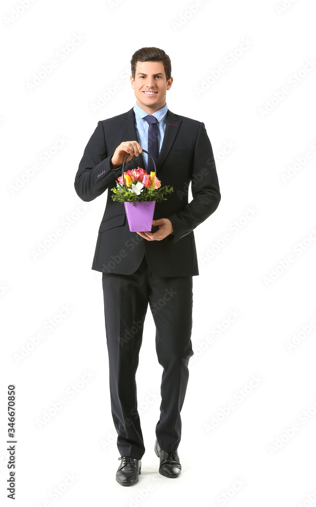Handsome man with bouquet of flowers on white background Handsome man with bouquet of flowers on white background