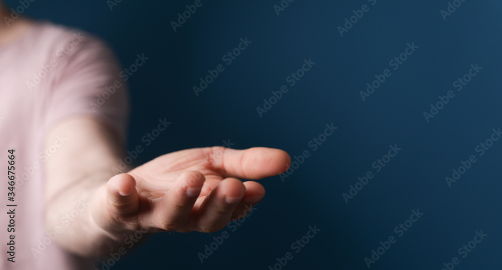 A man without head holding something without theme. A man without head holding something without theme.