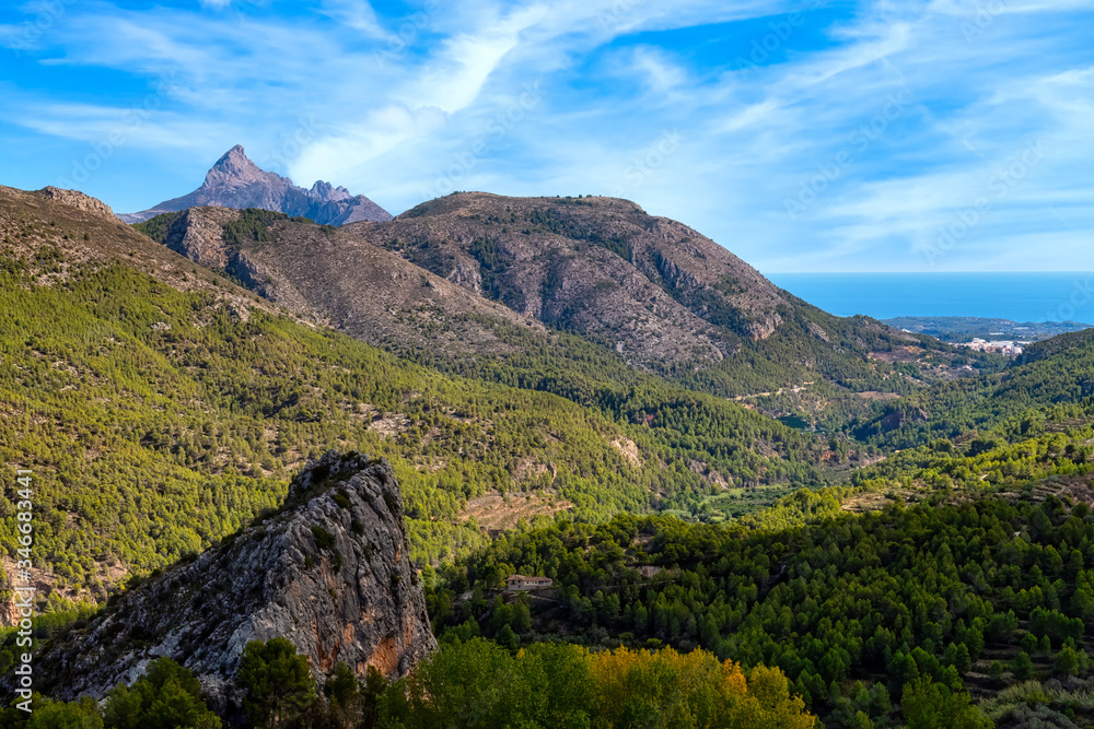 Beautiful mountain landscape in the interior near Alicante with view to the sea, Spain