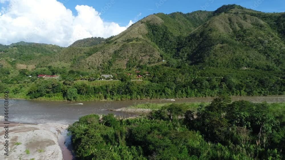 Drone flying up the river in the south american jungle. Drone flying up the river in the south american jungle.