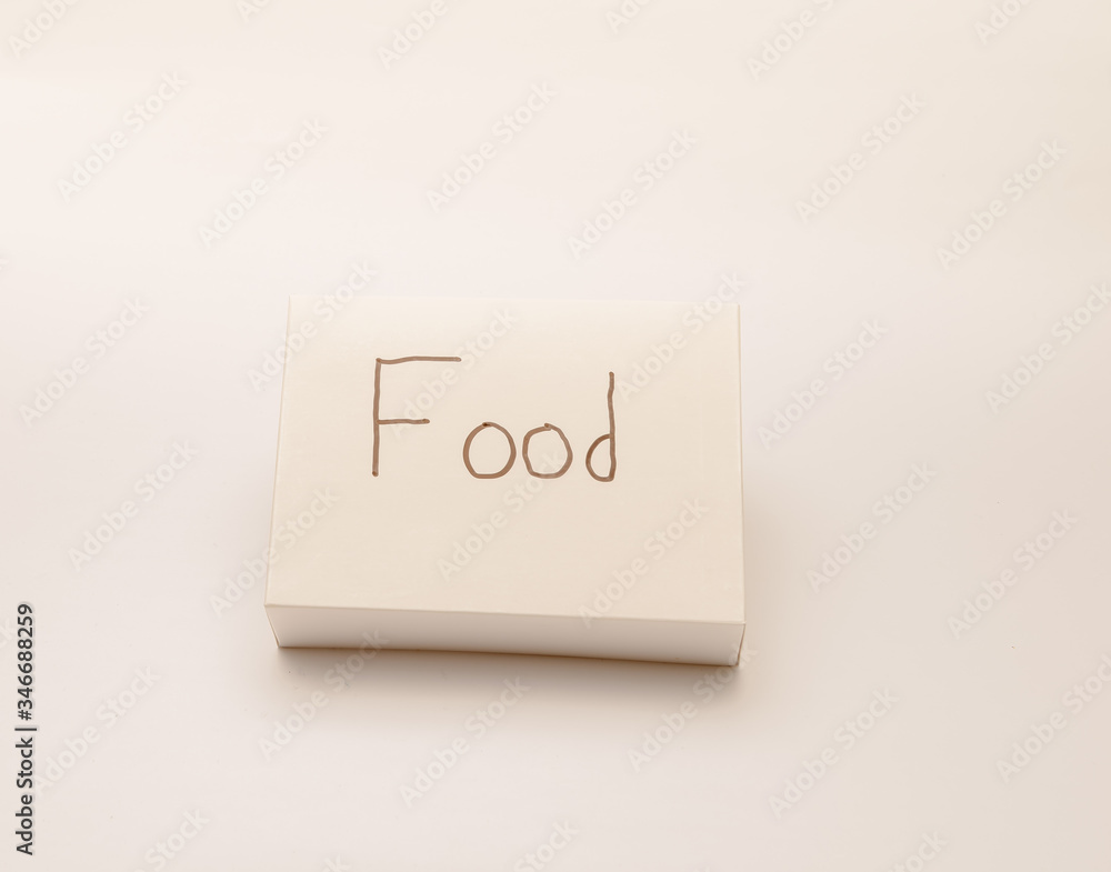 White cardboard take out food box isolated against white background. White cardboard take out food box isolated against white background.