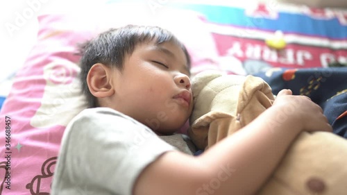 Baby boy sleeping daytime at home