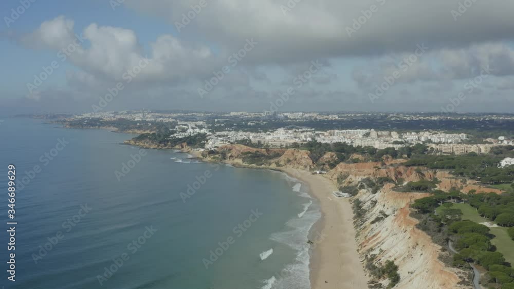 Amazing View From Above Of Sandy Beach With a City In The Background In Portugal Amazing View From Above Of Sandy Beach With a City In The Background In Portugal