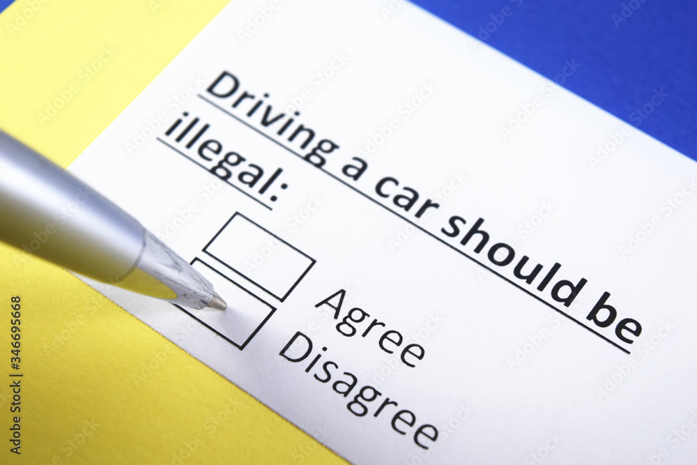 Fototapeta premium Driving a car Should be illegal: Agree or Disagree?