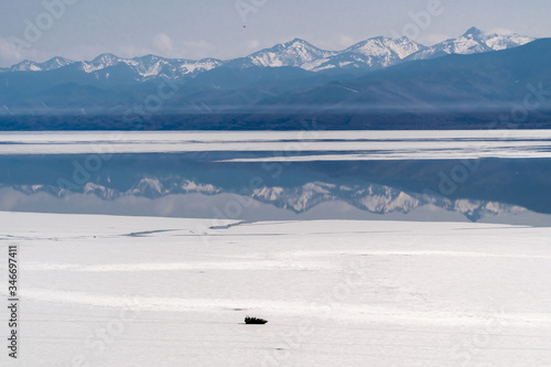 фотографія Aero boat rides on melting Baikal ice