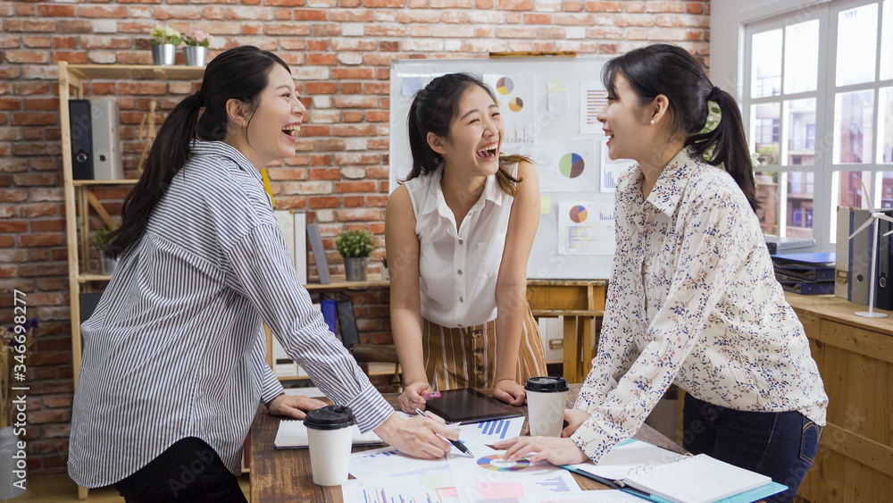 © PRPicturesProduction - People meeting conference discussion brainstorming concept. three happy asian japanese lady coworkers laughing cheerful in boardroom during teamwork. women colleagues having fun while working. © PRPicturesProduction - People meeting conference discussion brainstorming concept. three happy asian japanese lady coworkers laughing cheerful in boardroom during teamwork. women colleagues having fun while working.