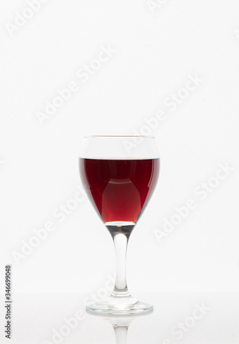 glass of red wine isolated on white background