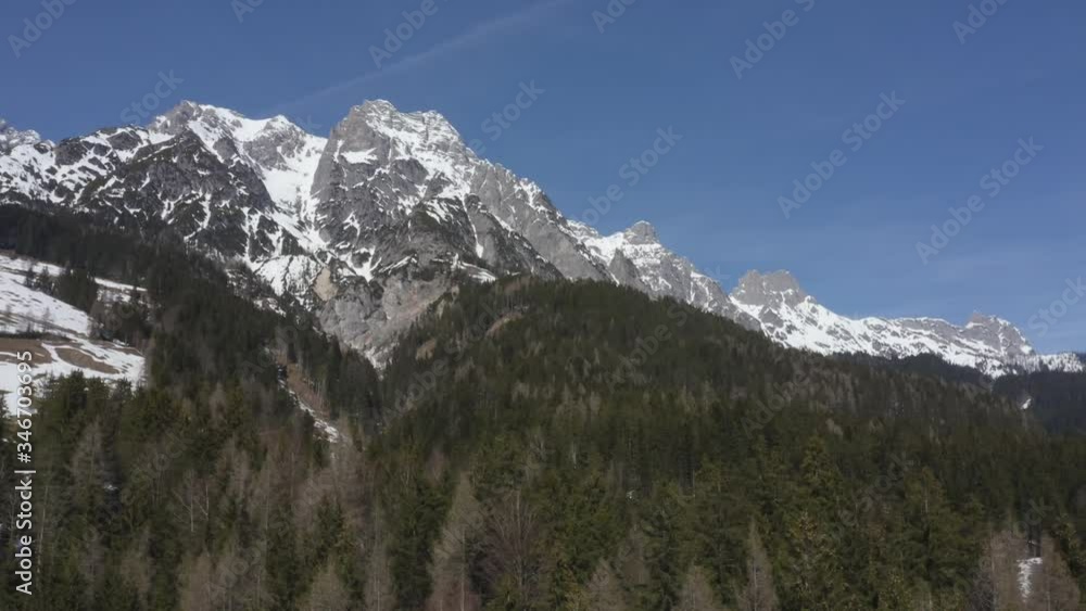 Aerial Pan above snowy forest in the Austrian Mountains Aerial Pan above snowy forest in the Austrian Mountains
