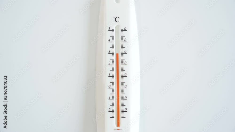The look of the white room thermometer on the white table The look of the white room thermometer on the white table