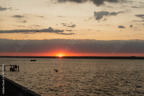 Sunrise at sea a beautiful dawn gives peace and silence for a normal life and exercise in the early morning.