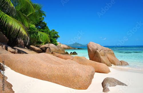 Big granite stones on the coast of the tropical island La Digue at Anse Severe beach, Indian ocean, Seychelles.