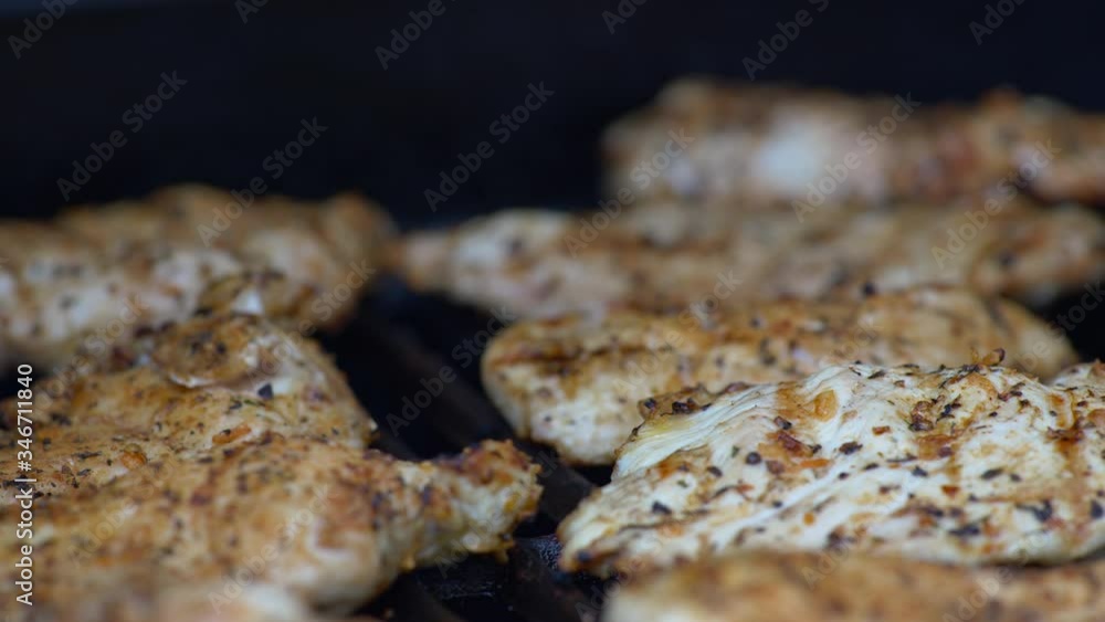 Close Up of Bbq Chicken Breast On A Grill Close Up of Bbq Chicken Breast On A Grill