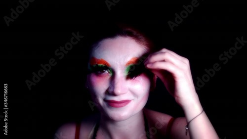 4k Woman Dressed up as Madhatter Taking off Makeup photo