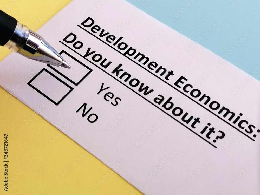 One person is answering quetion about development economics. One person is answering quetion about development economics.