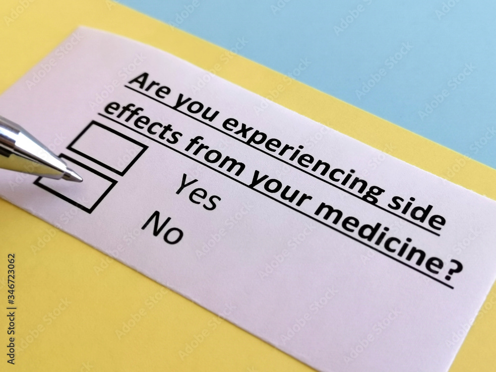 One person is answering question about medication side effect. One person is answering question about medication side effect.