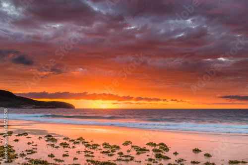 Cloudy Sunrise Colours Up at the Seaside