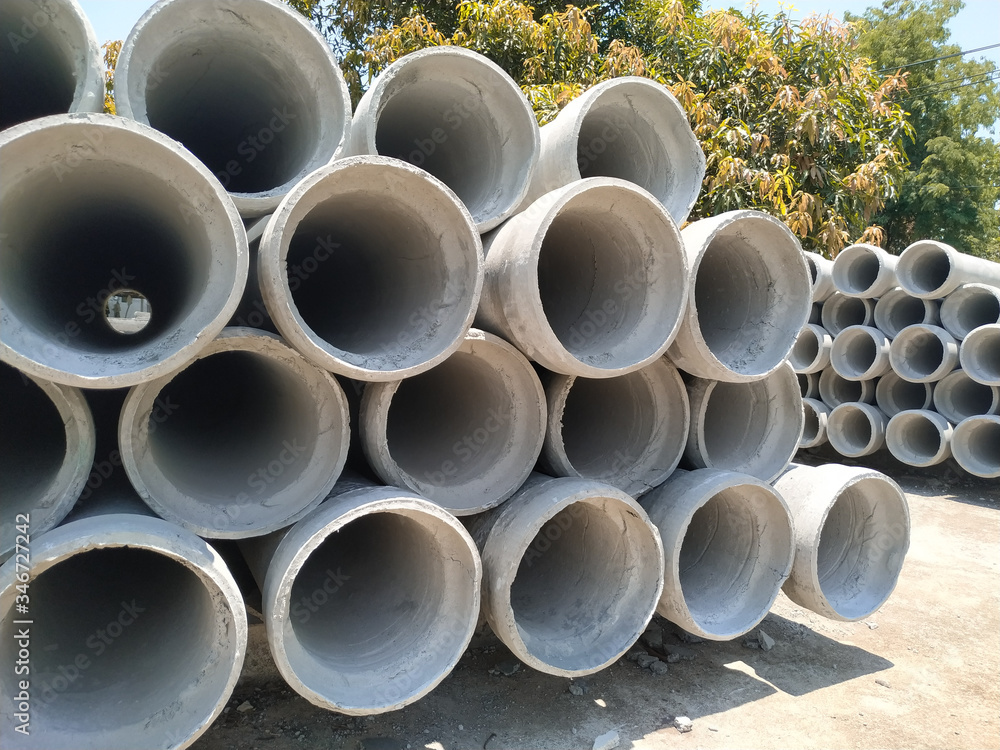 Pile of cement pipes close-up. Pile of cement pipes close-up.