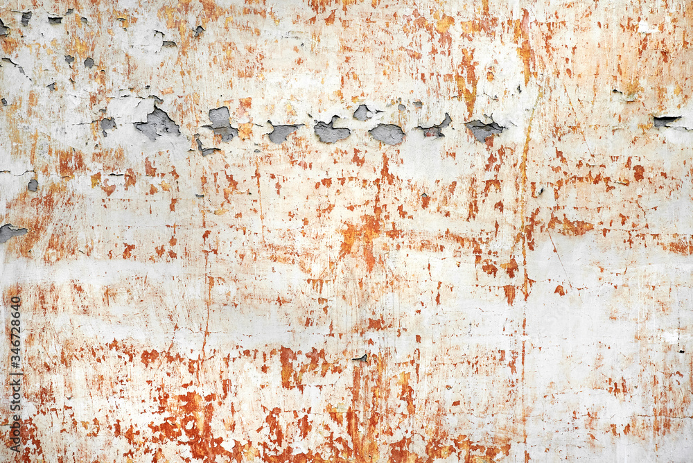 Obraz premium shabby red stucco with cracks and flakes of paint