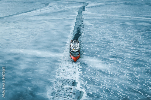 High angle view of ship moving through frozen Bothnian Sea