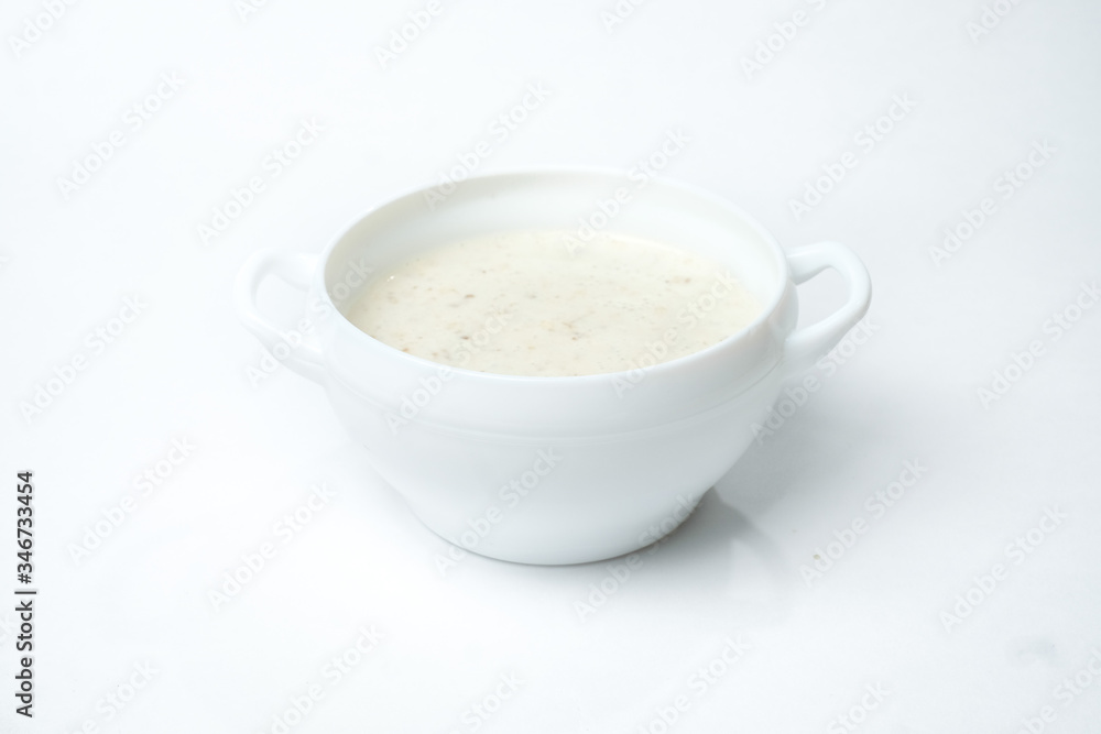 food soup in a white plate on a white background food soup in a white plate on a white background