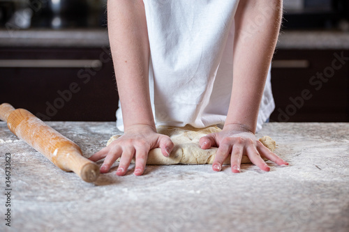 Girl making pizza dough © Mykola Sushkov