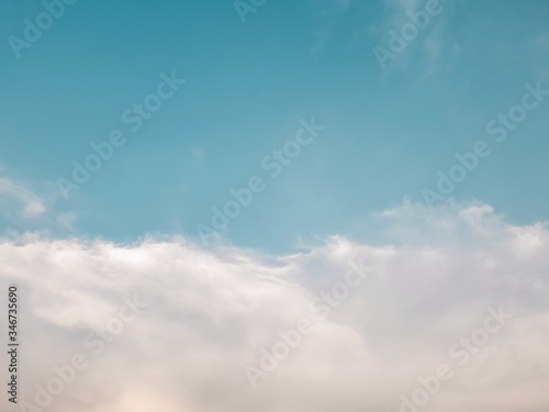 Fototapeta Naklejka Na Ścianę i Meble -  blue sky with clouds.Floating white clouds  in the sky background with copy space.